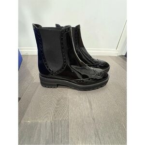 Sleek Black Patent Leather Boots